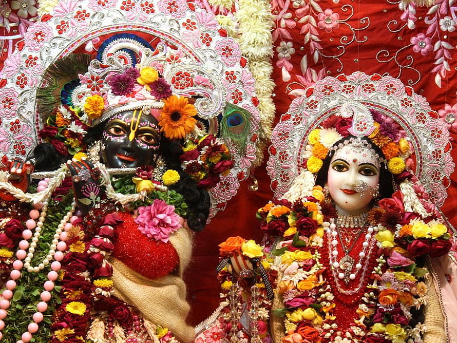 Radha Krishna Temple Deities Adorned With Fresh Flowers And Jewels HD wallpaper
