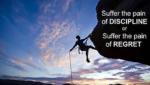 Rock Climber Silhouette Against Sunset Sky With Motivational Discipline Quote HD wallpaper