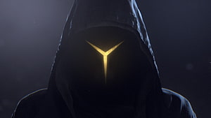 Mysterious Hooded Figure with Glowing Golden Y Symbol on Face HD wallpaper
