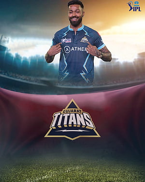 Gujarat Titans Player in Team Jersey with Official Logo and Stadium Background HD phone wallpaper
