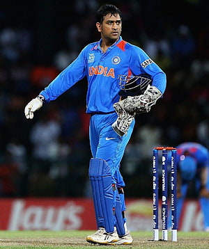 MS Dhoni in India Cricket Kit Standing at the Wicket with Helmet and Pads HD phone wallpaper