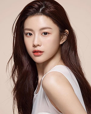 Portrait of a young woman with long brown hair and a white top, Go Yoon Jung HD phone wallpaper