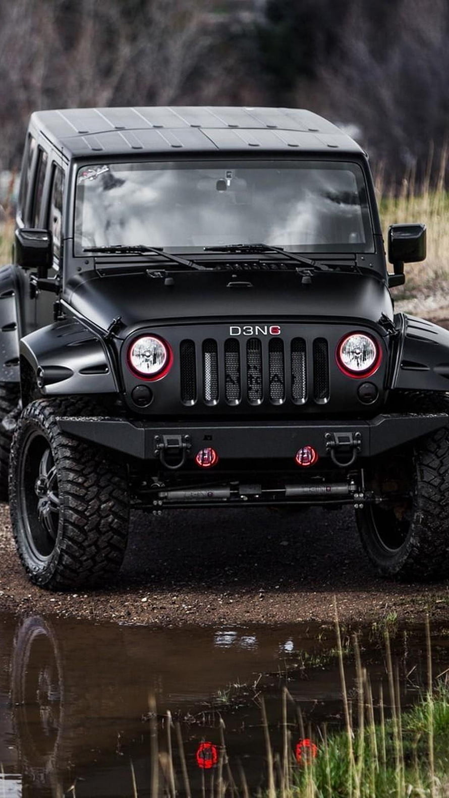 Black Jeep Wrangler Off-Road SUV with Red Accents in Muddy Terrain HD phone wallpaper