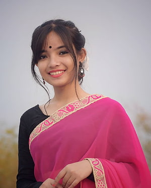 Young woman in a vibrant pink sari with gold embroidery and traditional bindi, Young Assamese girl, #assamese girl HD phone wallpaper