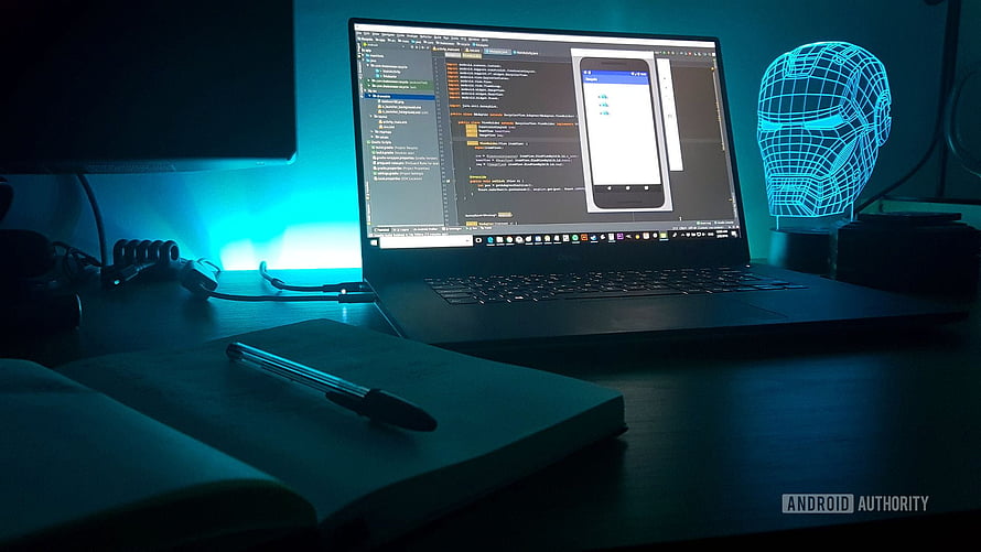 Dark Developer Workspace With Code Editor, Notebook, and Neon Iron Man Head Sculpture, Android Developer, app development HD wallpaper