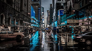 Rainy Times Square Street Scene with Neon Reflections and Yellow Cabs HD wallpaper