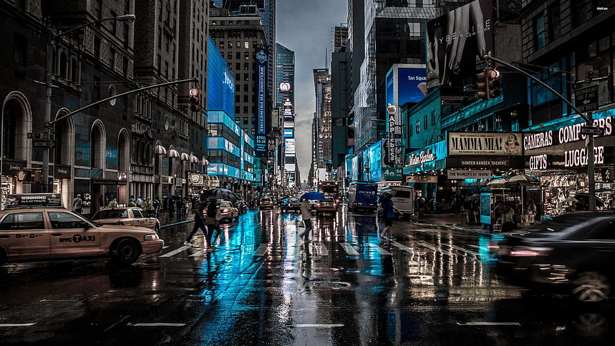 Rainy Times Square Street Scene with Neon Reflections and Yellow Cabs HD wallpaper