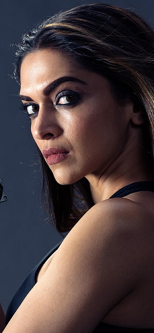 Deepika Padukone dramatic studio portrait with dark smoky eye makeup and intense gaze HD phone wallpaper
