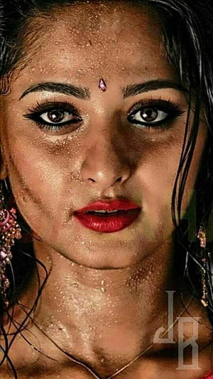 Anushka Shetty Close-Up Portrait with Wet Hair and Red Lipstick HD phone wallpaper
