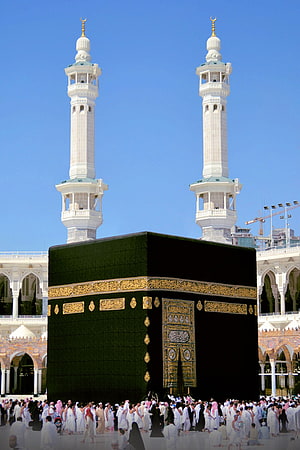 The Kaaba in Mecca with Minarets and Pilgrims HD phone wallpaper