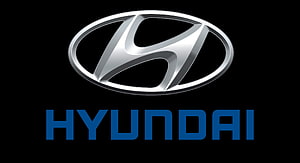 Hyundai Corporate Logo with Blue Wordmark on Black Background HD wallpaper