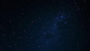 Deep Space Star Field with Dense Blue Nebula and Scattered Distant Stars HD wallpaper