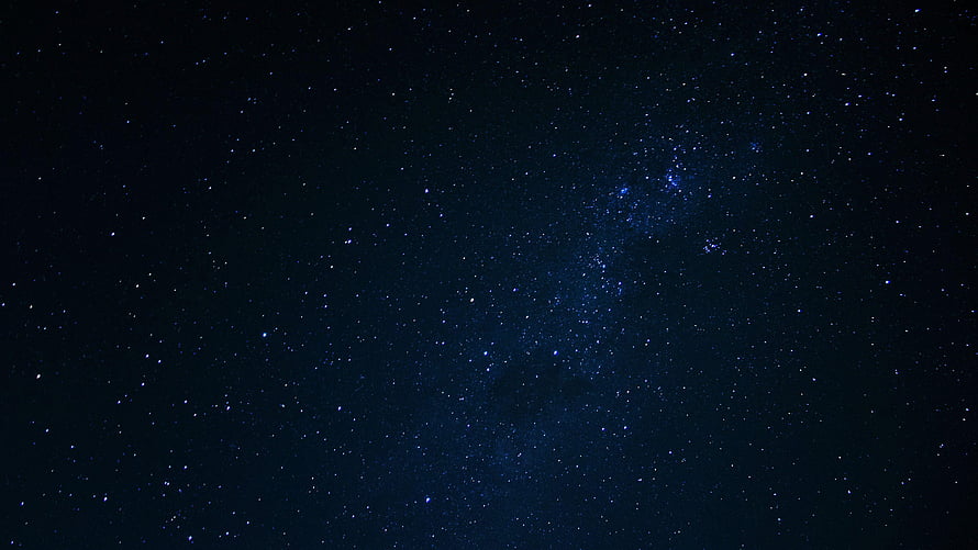 Deep Space Star Field with Dense Blue Nebula and Scattered Distant Stars HD wallpaper