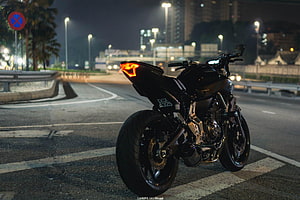 Yamaha MT-07 Black Sport Motorcycle Parked on City Street at Night HD wallpaper