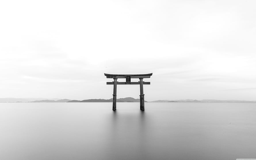 Serene Black And White Photograph Of A Torii Gate Standing In Calm Water HD wallpaper