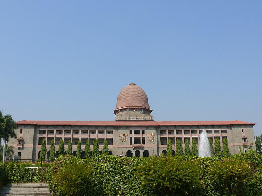 Sudan Block at the National Defence Academy in India with manicured gardens and a central fountain HD wallpaper