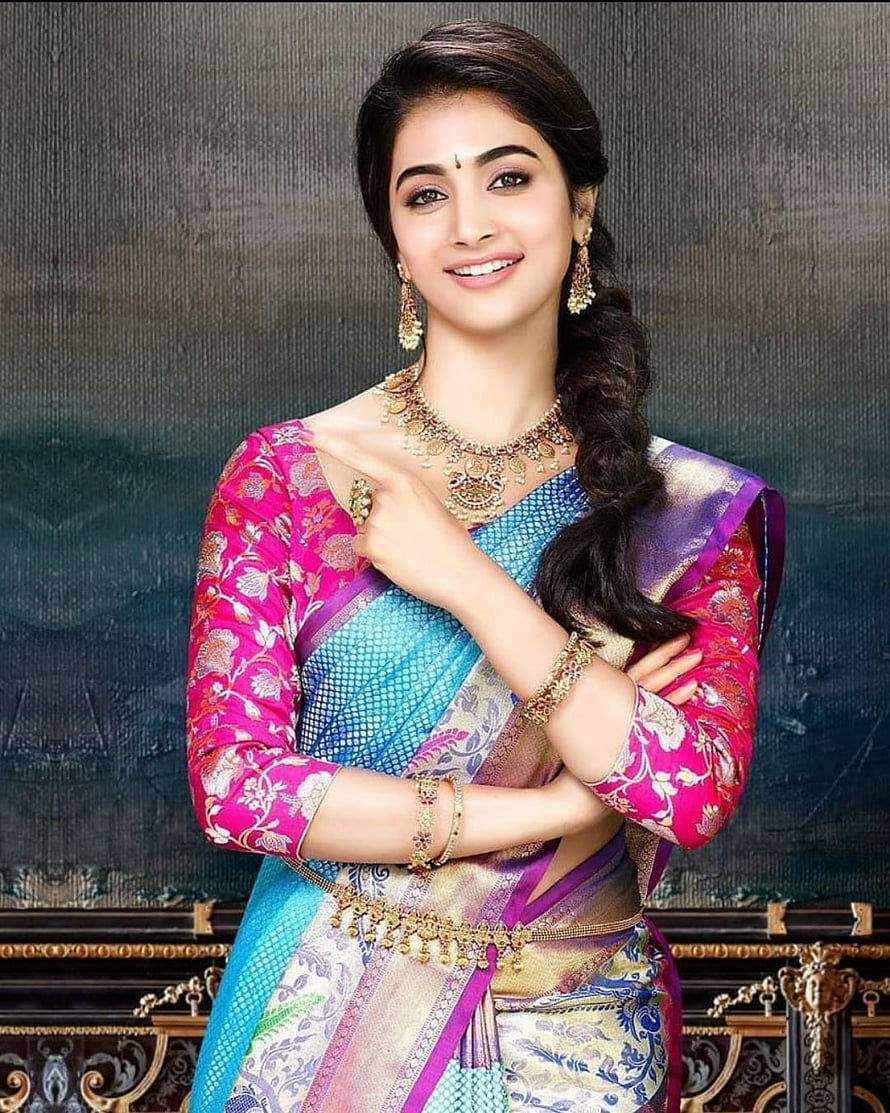 Pooja Hegde in a vibrant blue and pink saree with traditional gold jewelry HD phone wallpaper