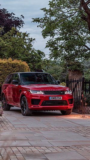 Red Range Rover Sport SVR Parked on a Stone Driveway at Dusk HD phone wallpaper