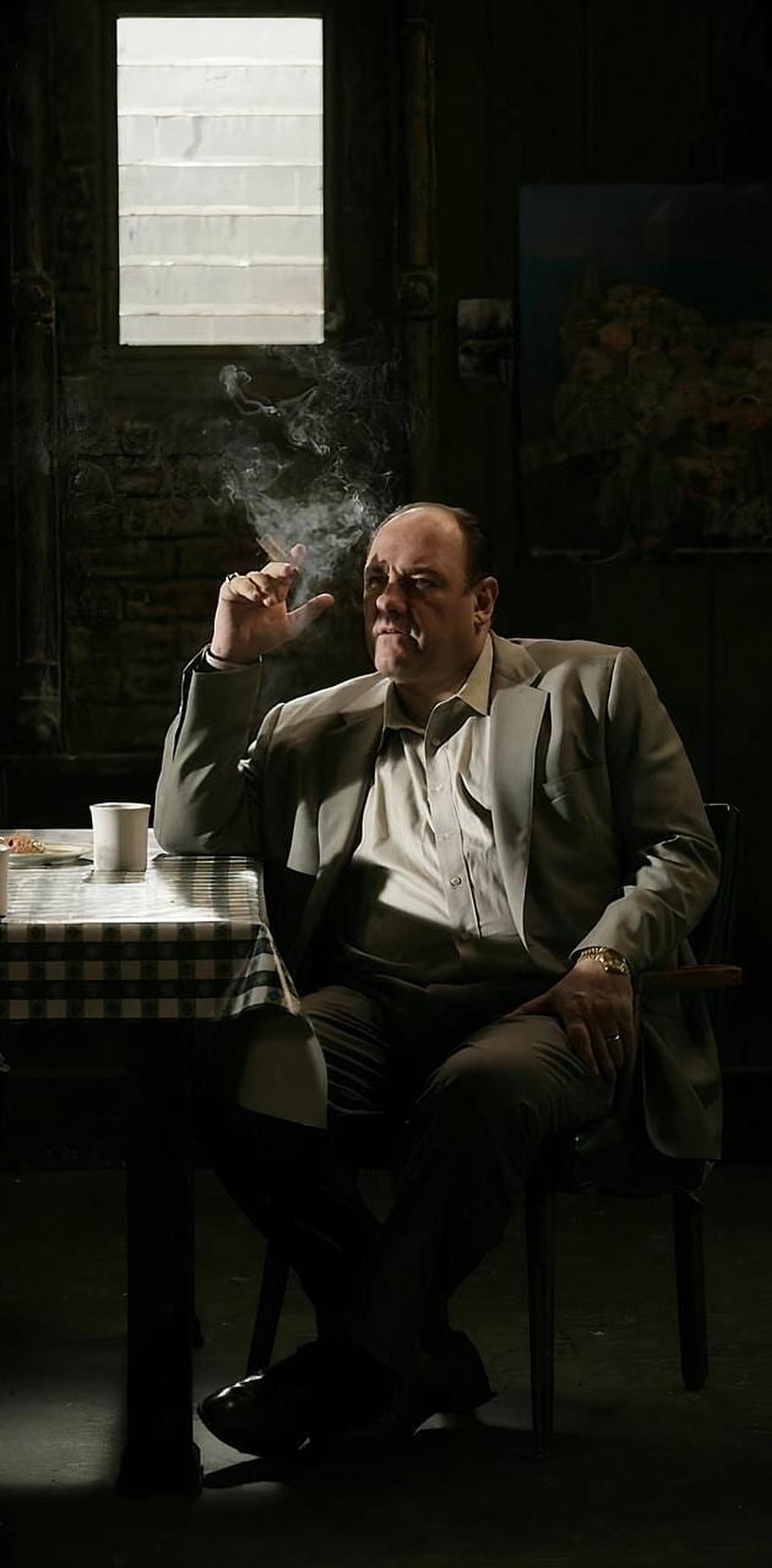 Tony Soprano Smoking Cigar in Dimly Lit Room with James Gandolfini HD phone wallpaper