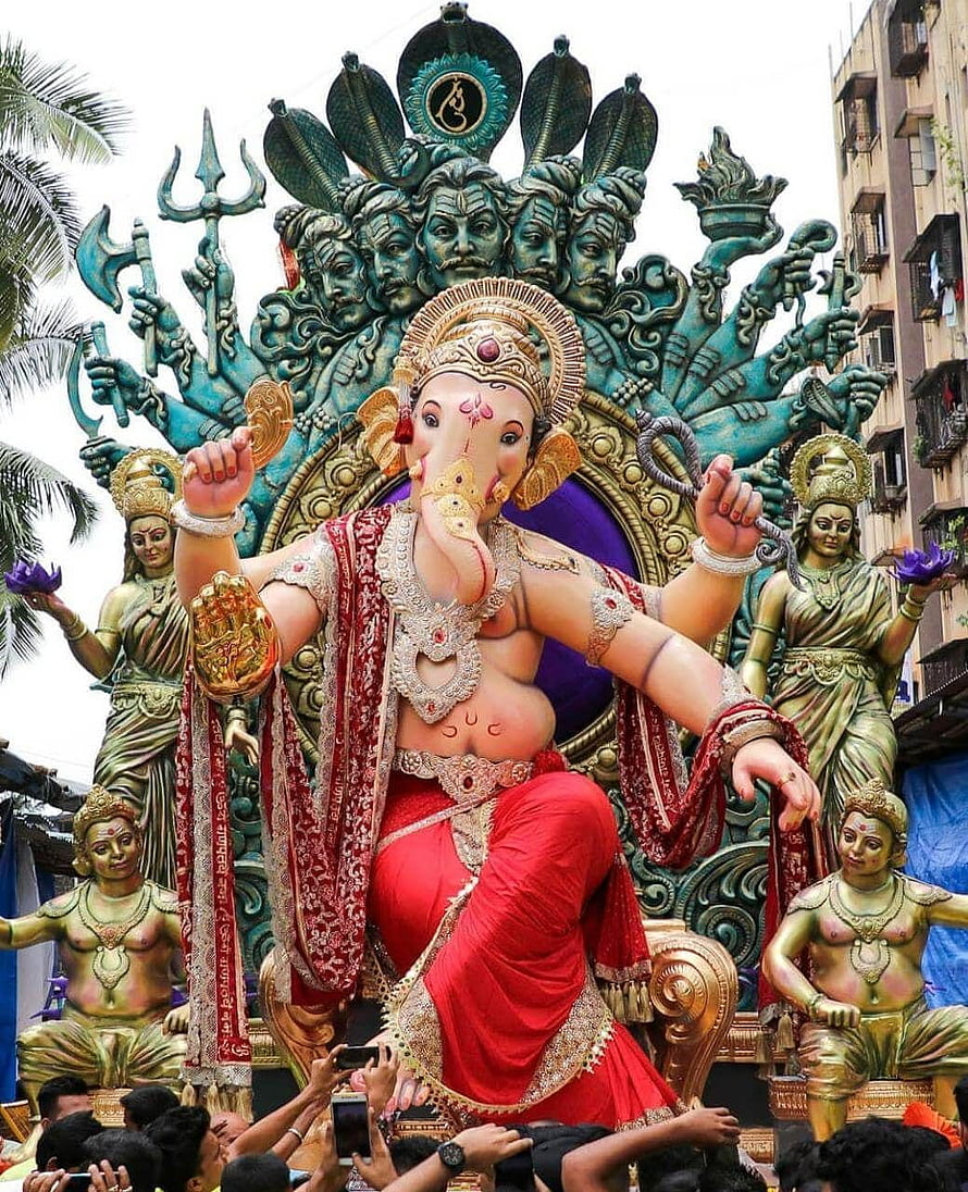 Grand Ganesha Idol with Multi-Headed Serpent Canopy and Divine Attendants HD phone wallpaper