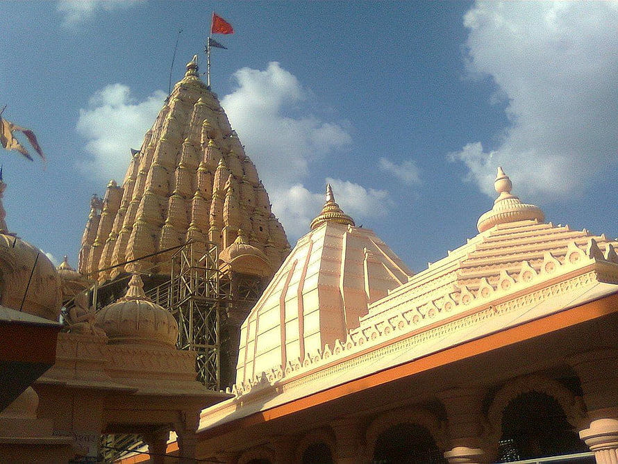 Hindu Temple Architecture With Intricate Shikhara Dome And Pillared Hall HD wallpaper