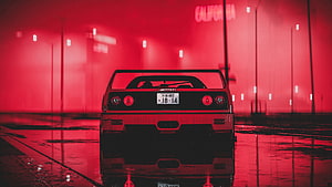 Rear View of a Classic Sports Car in a Red Neon Lit Parking Garage HD wallpaper