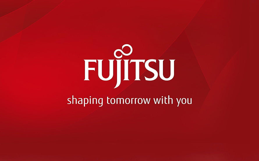 Fujitsu Corporate Logo on Deep Red Geometric Background with Tagline HD wallpaper