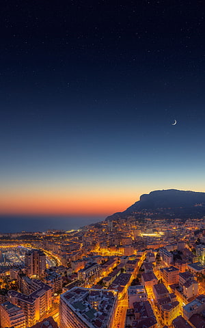 Marseille Cityscape at Dusk with Starry Sky and Crescent Moon Over the Mediterranean Coast HD phone wallpaper