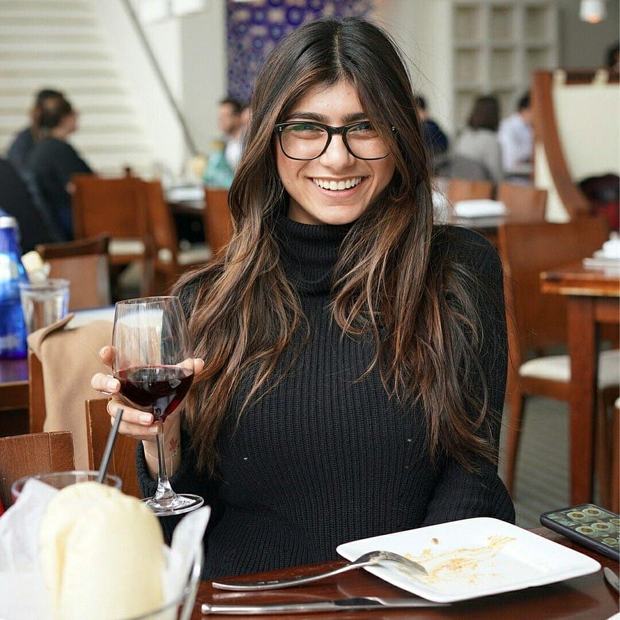 Happy Woman With Glasses Holding Red Wine Glass At Restaurant Table, Mia Khalifa HD phone wallpaper