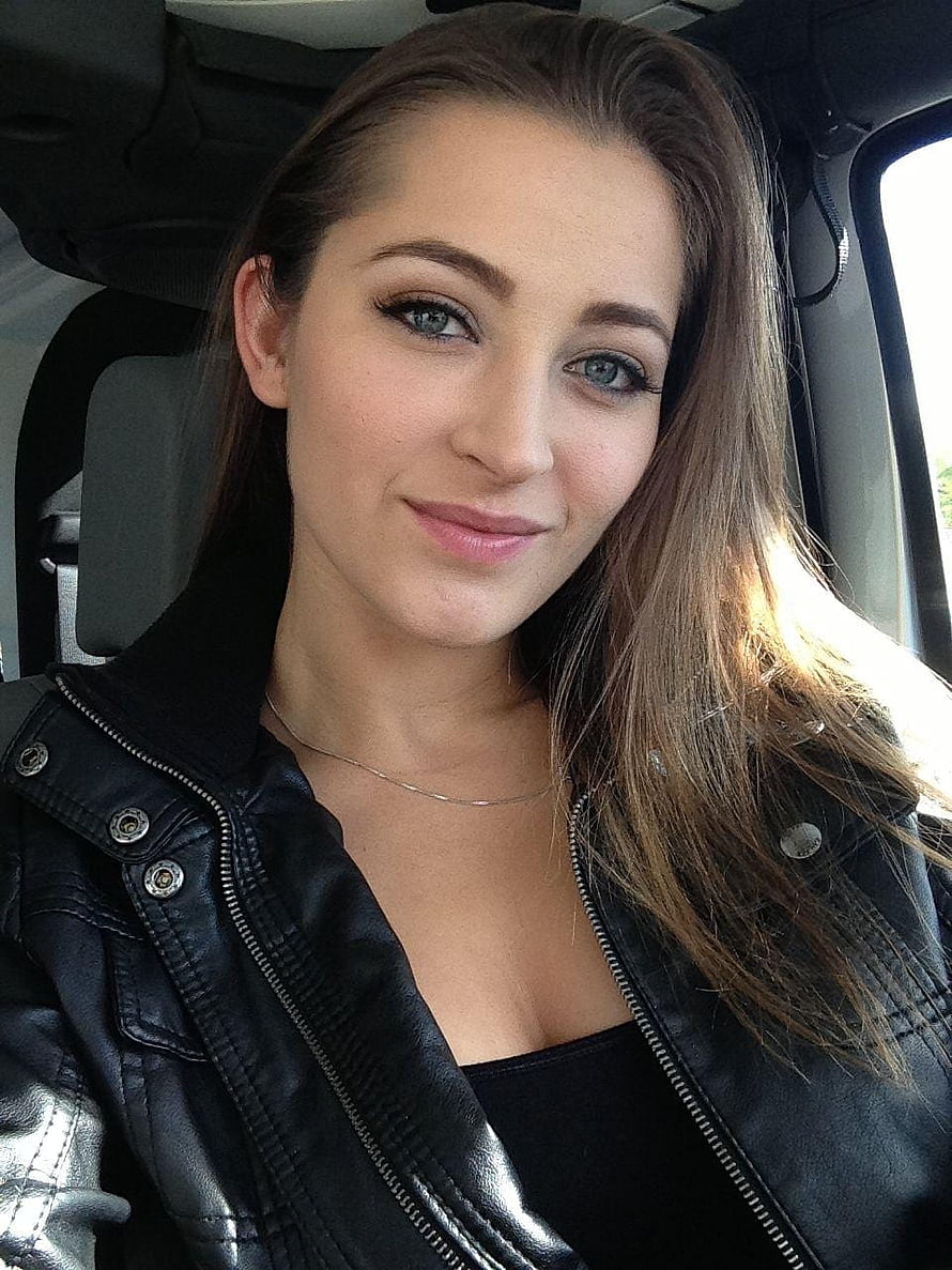 Portrait of Dasha Taran in a black leather jacket sitting inside a car HD phone wallpaper