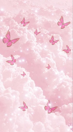 Dreamy Pink Butterflies Floating in Soft Cloudy Sky with Sparkles HD phone wallpaper