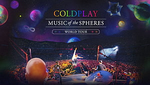 Coldplay Music of the Spheres World Tour Concert Stage with Cosmic Planets and Live Audience HD wallpaper