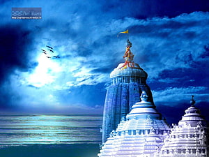 Jagannath Temple in Puri, India, Rising Against a Dramatic Blue Sky and Ocean Horizon HD wallpaper