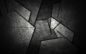 Dark Geometric Concrete Texture with Angular Overlapping Panels and Dramatic Shadow Play HD wallpaper