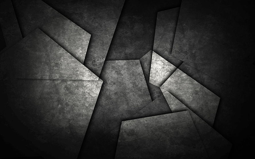 Dark Geometric Concrete Texture with Angular Overlapping Panels and Dramatic Shadow Play HD wallpaper