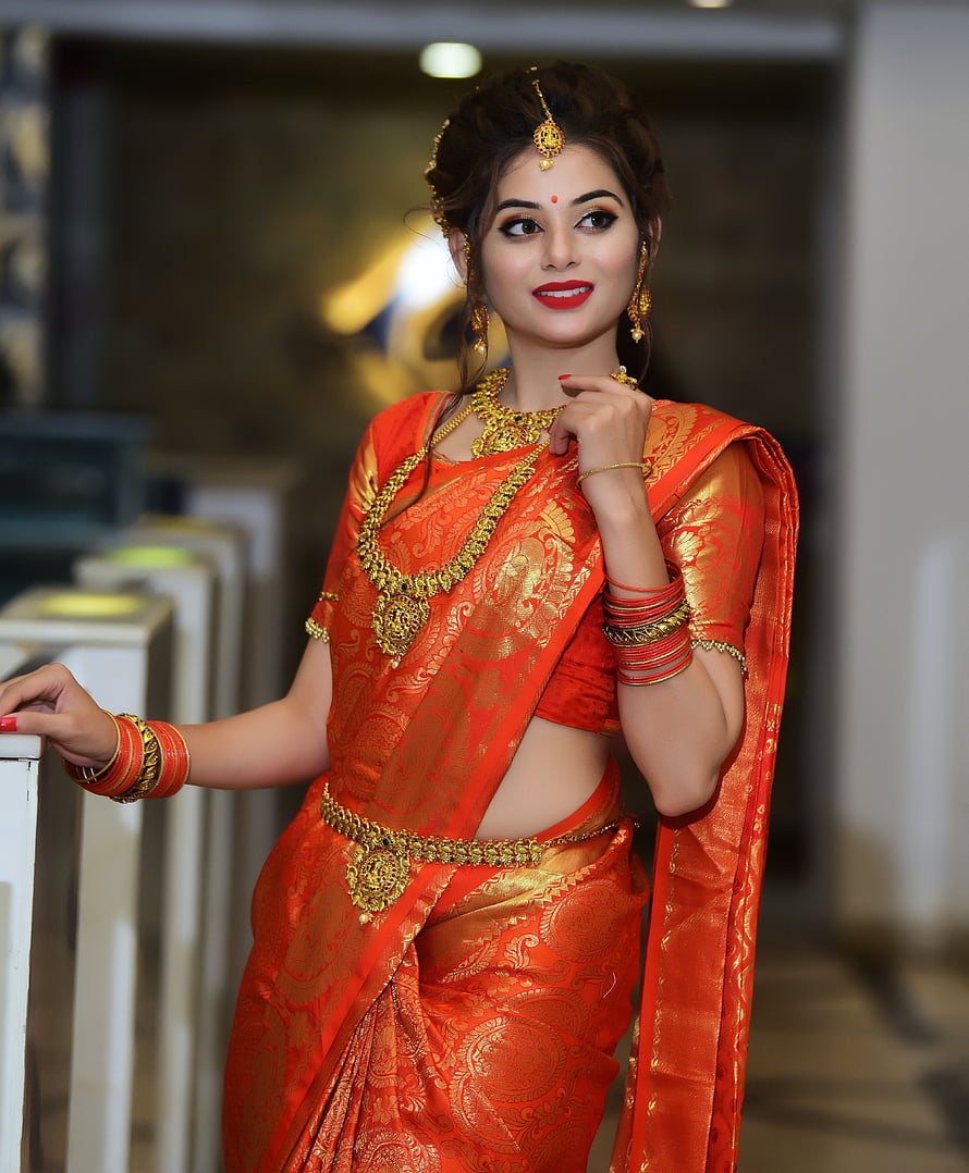 Woman in Traditional Orange Silk Saree with Heavy Gold Jewelry, stock of beautiful girl, desi girl, desi girls, beautiful desi girl HD phone wallpaper