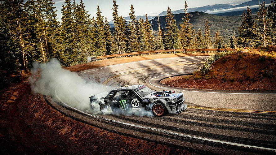 Ken Block Ford Mustang Rally Car Drifting on Mountain Road HD wallpaper