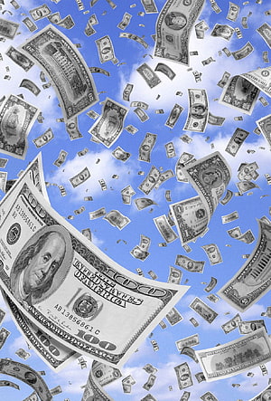 US Dollar Bills Raining Down Against a Bright Blue Sky HD phone wallpaper