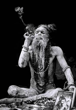 Aghori Sadhu Smoking Hookah in Black and White Portrait HD phone wallpaper