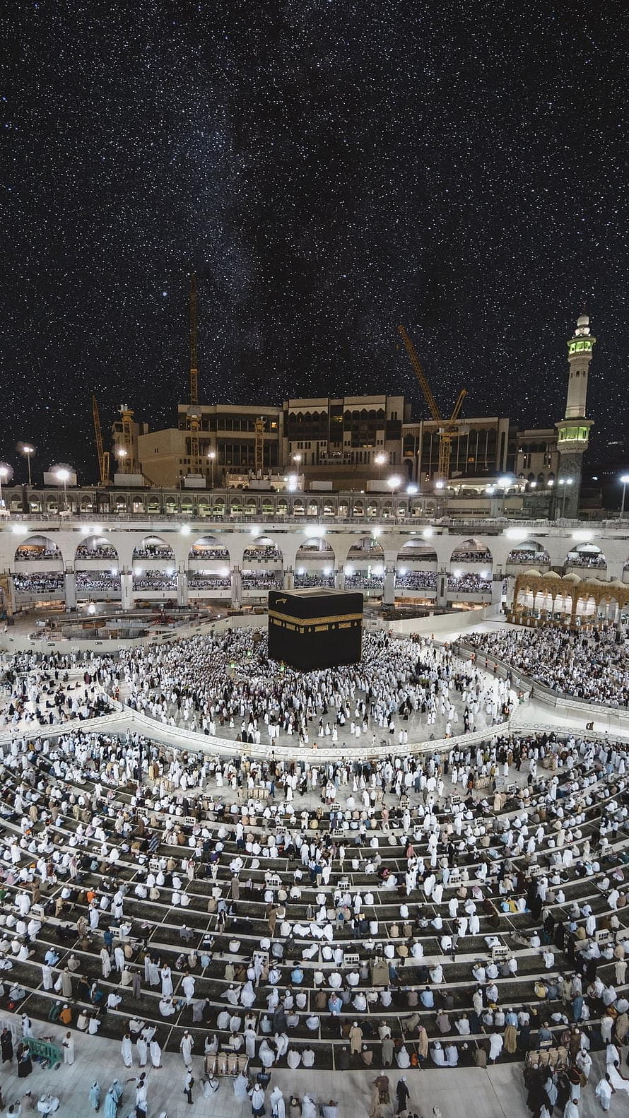 Night View of the Kaaba in Mecca with Starry Sky and Pilgrims HD phone wallpaper