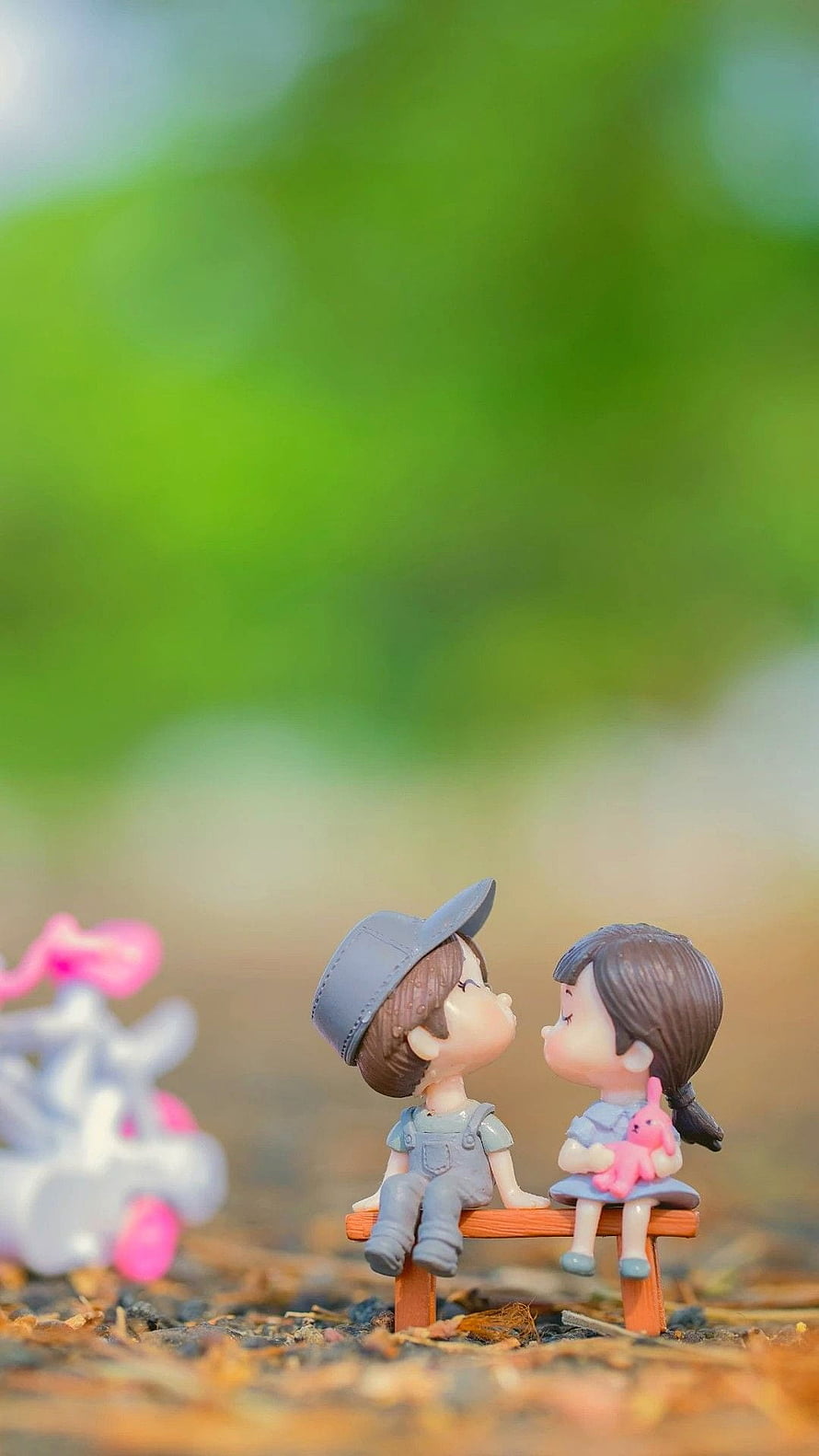 Cute Miniature Couple Sitting on Bench in Nature HD phone wallpaper