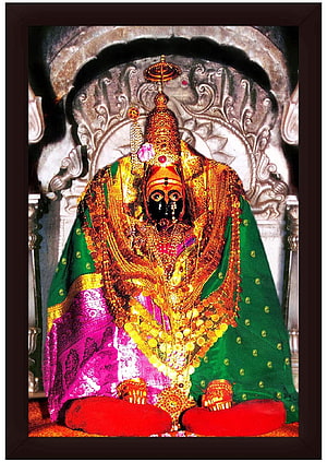Tulja Bhavani Mata Temple Deity Adorned in Gold Jewelry and Vibrant Silk Garments HD phone wallpaper