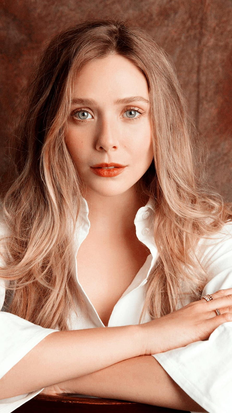 Elizabeth Olsen Portrait in White Shirt with Warm Brown Backdrop HD phone wallpaper