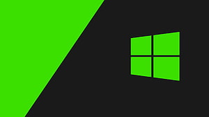 Minimalist Windows 11 Logo on Black and Green Diagonal Background HD wallpaper