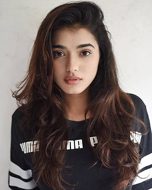 Ketika Sharma Portrait With Long Wavy Hair Wearing Black Puma Shirt HD phone wallpaper