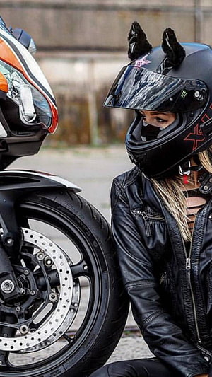 Biker Girl in Black Leather Jacket and Cat Ear Helmet Leaning Against Sport Motorcycle HD phone wallpaper