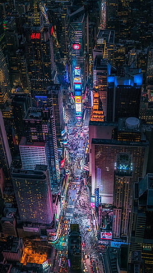 Aerial Night View of Times Square Manhattan with Glowing Neon Billboards and City Lights HD phone wallpaper