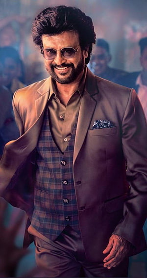 Rajinikanth in Darbar wearing a brown suit and plaid vest with sunglasses HD phone wallpaper