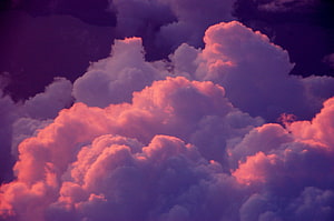 Vibrant Pink and Purple Clouds at Sunset HD wallpaper