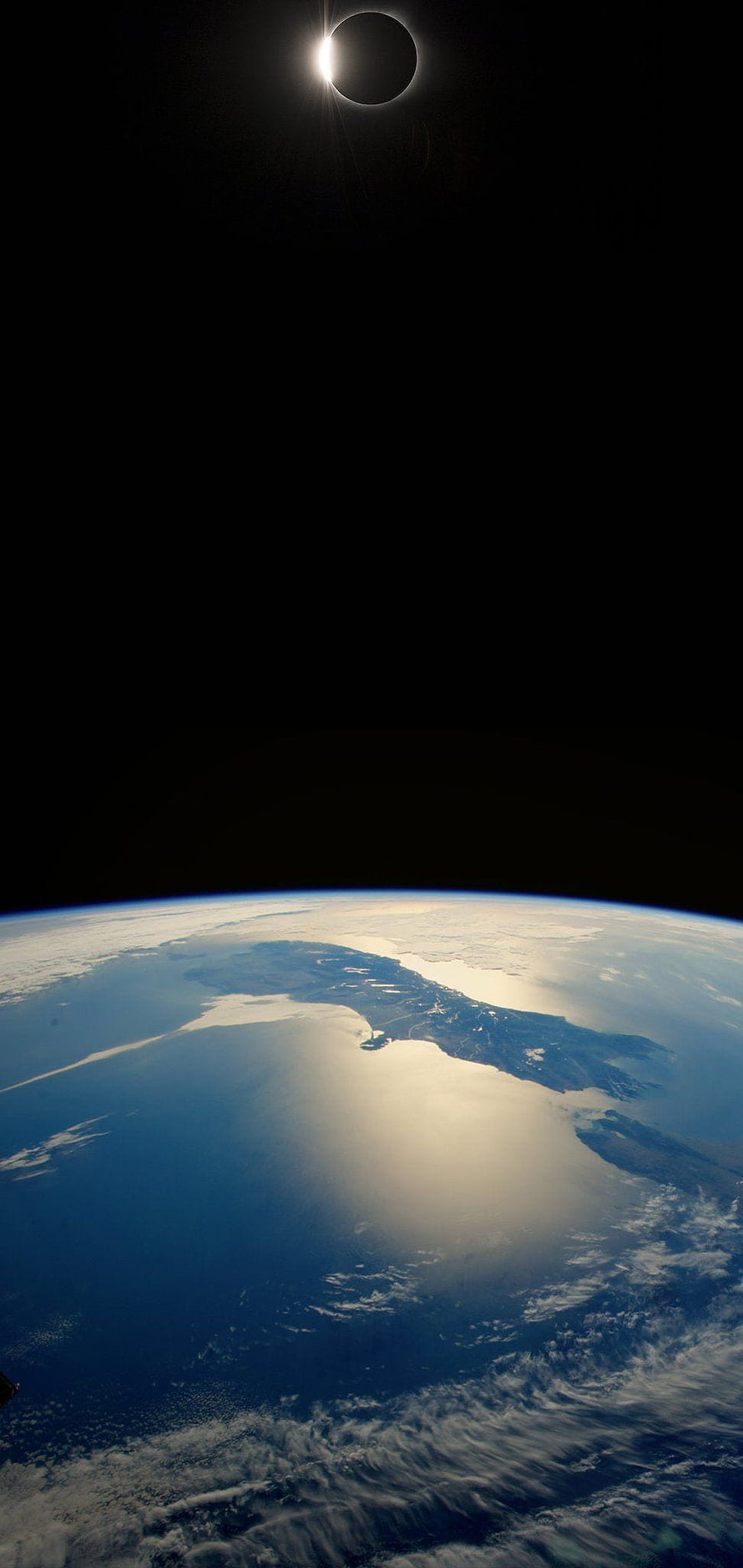 Total Solar Eclipse Over Earth From Space With Dramatic Corona and Ocean View HD phone wallpaper